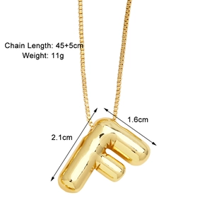 Detail view of 3D gold letter F pendant necklace with chain length and size specs