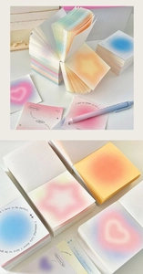 Detail of 400 sheets thick gradient memo pad with inspirational quotes and halo design