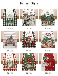 Close-up of nine Christmas table runner designs featuring reindeer and Santa Claus