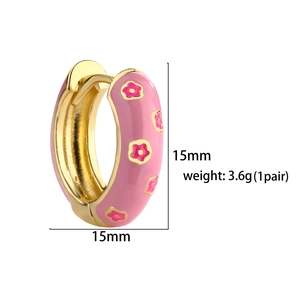 Detailed view of pink enamel flower earrings showing 15mm diameter and 3.6g weight