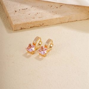 Detailed shot of square pink zircon drop earrings with gold plated micro-pave setting