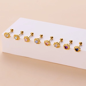 Set of eight gold hollow sunflower screw back earrings with colorful inlaid gemstones