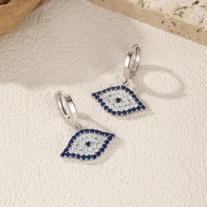 Elegant S925 sterling silver eye drop earrings featuring blue and white zircon stones