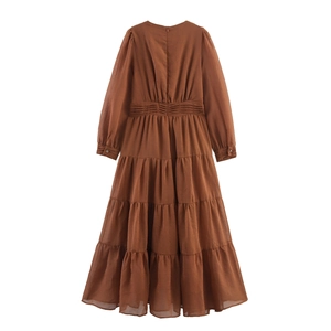 Brown long-sleeved pleated dress featuring a layered tiered design and back zipper
