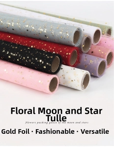 Detail of star and moon bronzing tulle mesh rolls for floral and gift packaging