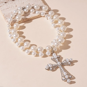 Double-layered pearl necklace with large silver cross pendant in vintage baroque style
