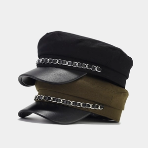 Vintage newsboy cap with metal chain decoration and black faux leather brim