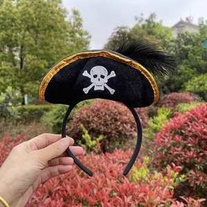 Halloween Caribbean pirate headband with skull print and black feathers for stage props