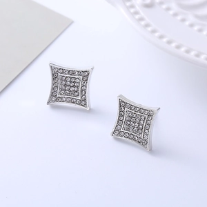 Detail of silver square stud earrings featuring micro-pave white cubic zirconia crystals