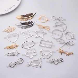 Assorted gold and silver metal alloy hair clips in geometric and nature inspired shapes