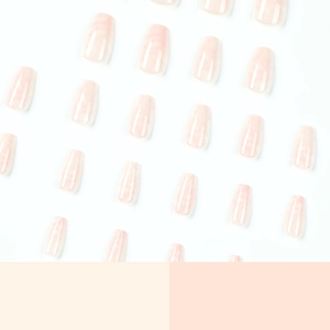 Short coffin press-on nails with nude jelly base and white marble gradient design