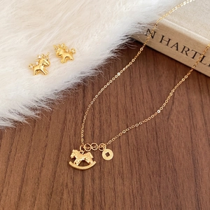 Elegant gold plated horse and coin jewelry set with necklace and zircon earrings