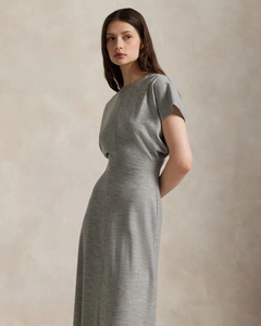 Detail of grey knitted midi dress showing waist cinching and soft textured fabric