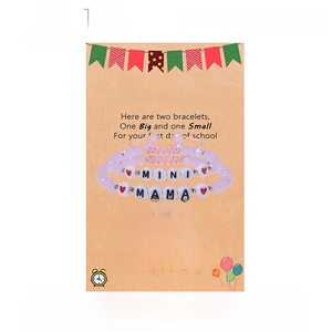 Pink faceted crystal Mama and Mini bracelet set on kraft display card with soft heart detail