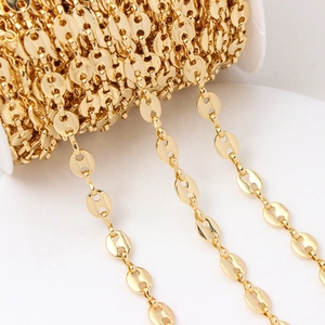 Macro shot of 18K gold-plated pig nose link chain for DIY jewelry making and bracelets