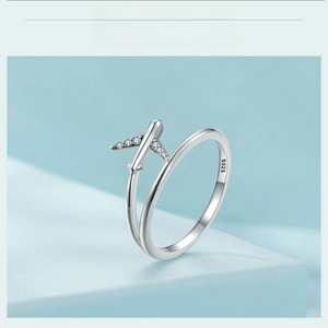 Detail of S925 sterling silver airplane ring with tiny white zircons and hallmark