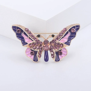Exquisite gold-plated butterfly brooch with purple enamel and sparkling rhinestones