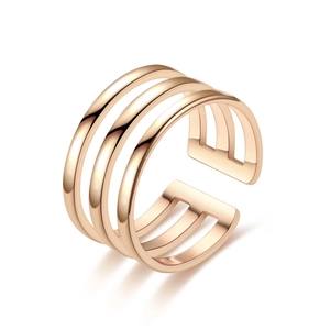 Detailed view of the layered rose gold adjustable titanium steel ring on white background