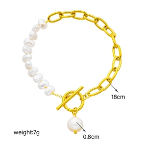 Punk style 18cm gold chain and pearl bracelet with OT clasp and pendant on white background