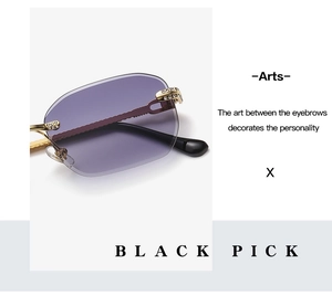 Detail shot of rimless sunglasses with purple gradient lens and gold rhinestone temple