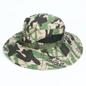Detail of wide-brimmed camouflage fishing hat with breathable mesh and side brand print