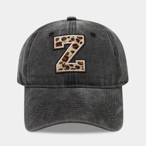Classic washed black baseball cap with leopard print letter Z and vintage cotton texture