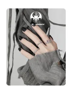 Close-up of S925 silver rings with geometric purple zircon and gothic dragon design