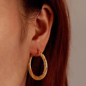 French style 18k gold plated twisted hoop earrings for women with metallic texture