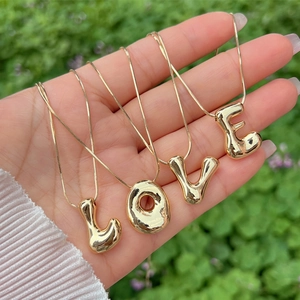 Polished 18K gold plated bubble letter LOVE pendant necklace with elegant snake chain