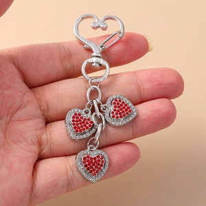 Fashion silver angel heart keychain with red rhinestones and three heart pendants charm
