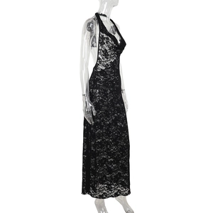 Close-up of elegant black lace textures on a halter backless long dress for women