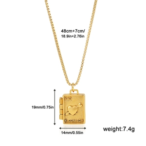 Detail view of 18K gold book locket necklace with dimensions and heart engraving