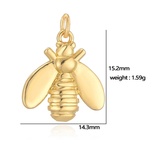 Detailed view of a gold bee pendant showing dimensions of 15.2mm by 14.3mm and weight
