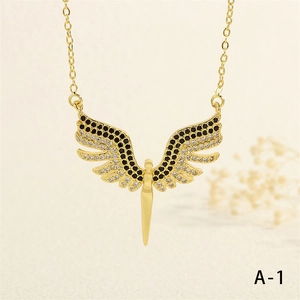 Detail of angel wing pendant with micro-inset zircons on gold-plated O-link chain