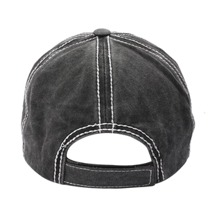 Detail view of washed cotton baseball cap with contrast stitching and adjustable strap