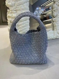 Gray woven denim tote bag with a minimalist hobo design and large capacity for women