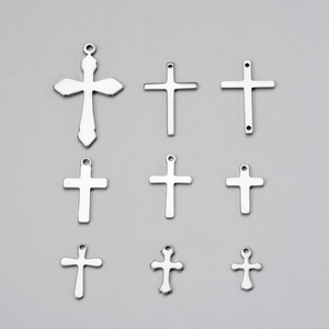 Various silver stainless steel cross pendants in nine different styles for jewelry DIY