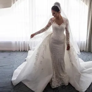 Elegante witte kanten zeemeermin trouwjurk met lange mouwen en afneembare sleep