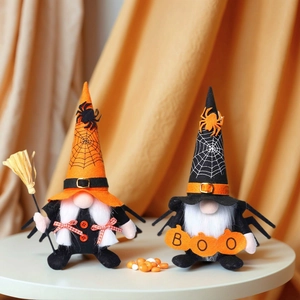 Halloween plush gnomes set with spider web patterns and Boo sign on bright background