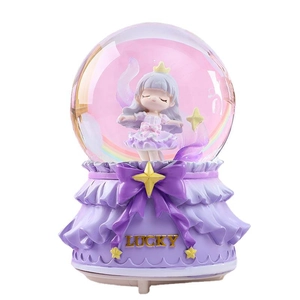 Purple musical snow globe with princess doll and golden Lucky inscription on base