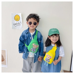 Kids cute cartoon bear crossbody bags in green and yellow colors shown by models