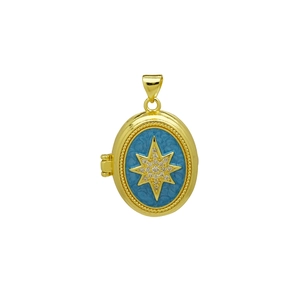 Détail d'un médaillon doré avec émail bleu et motif d'étoile en cristal étincelant