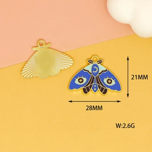 Blue enamel moth pendant detail with moon eye pattern and size 28x21mm dimensions