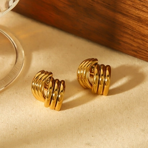 Triple interlocking gold hoops earrings for women in 18k plated stainless steel