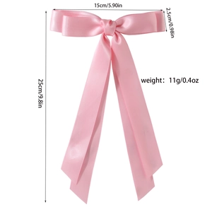 Barrette à double nœud en satin rose avec longs rubans et dimensions détaillées