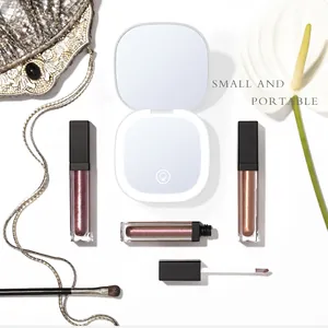 Portable LED vanity mirror with 5x magnification and lipstick makeup tools set