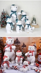 Detail of flocked Christmas polar bear figurines with knit hats in a festive setting