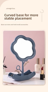 Cloud-shaped makeup mirror with mist blue petal frame and curved storage base