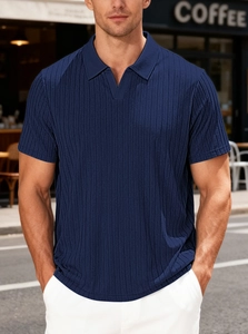 Detail of navy knit polo shirt texture and vertical striped pattern on slim fit fabric