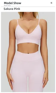 Model show of seamless cherry blossom pink yoga set with V-neck sports bra and leggings